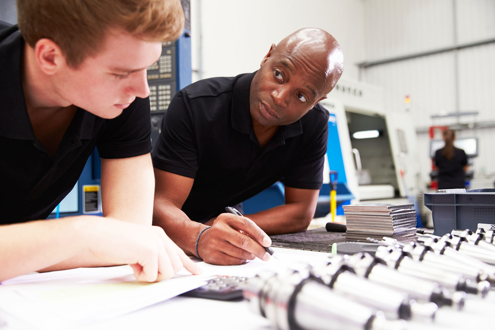 Instructor and student discussing project